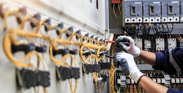 Professional Electrician technician working in Fannett, TX